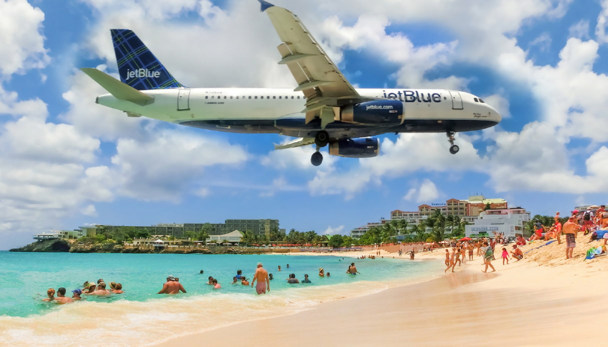 Atterraggio a Princess Juliana St. Maarten: l'aereo vicino alla spiaggia