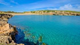 Spiaggia di Calamosche, Sicilia: un angolo di paradiso tra dune dorate e mare cristallino