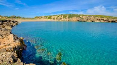 Spiaggia di Calamosche, Sicilia: un angolo di paradiso tra dune dorate e mare cristallino