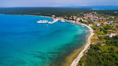 Olib, l’isola piatta che sorprende con sabbie rare nell’Adriatico e silenzi assoluti